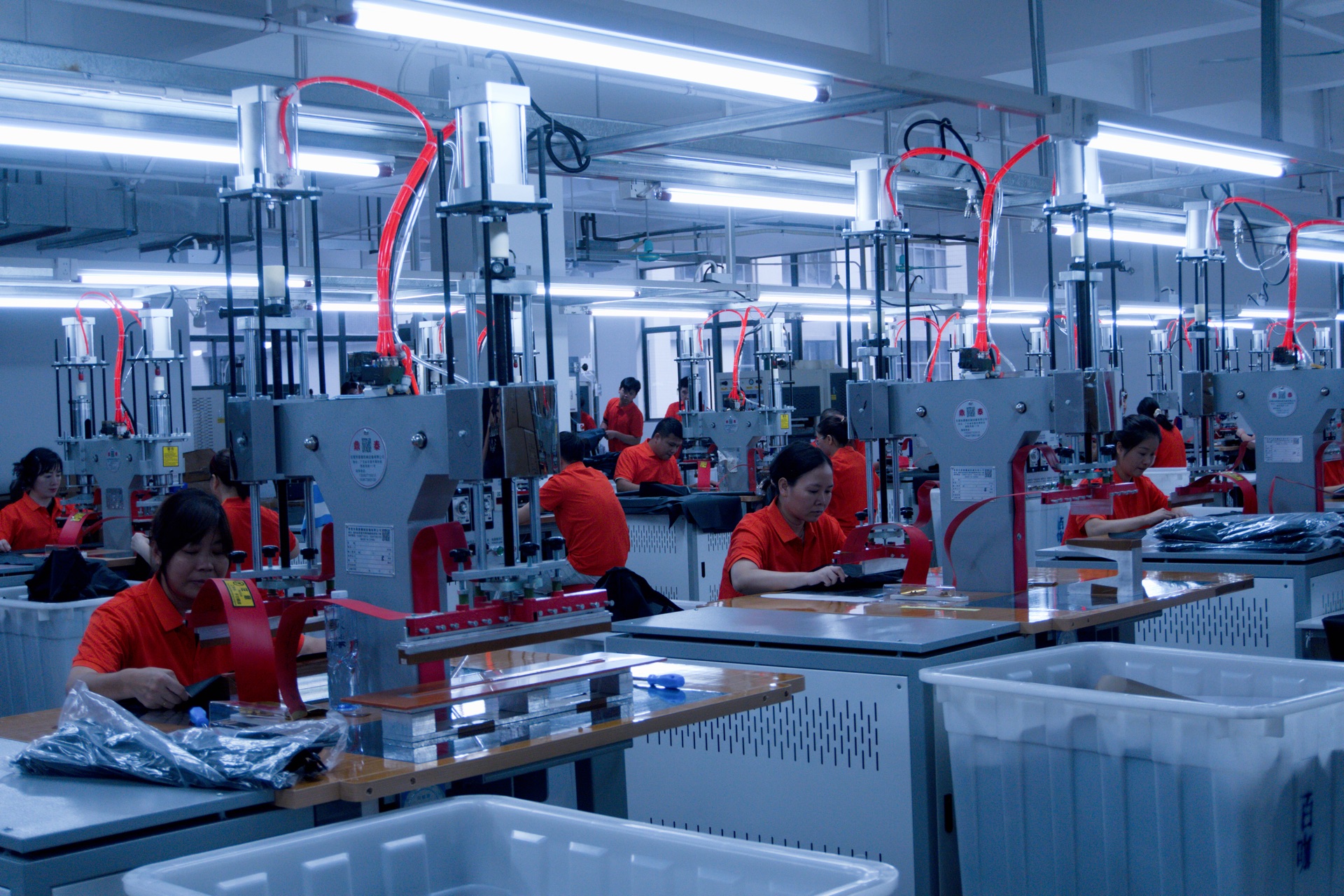 Team members working across the production floor at our Guangzhou factory